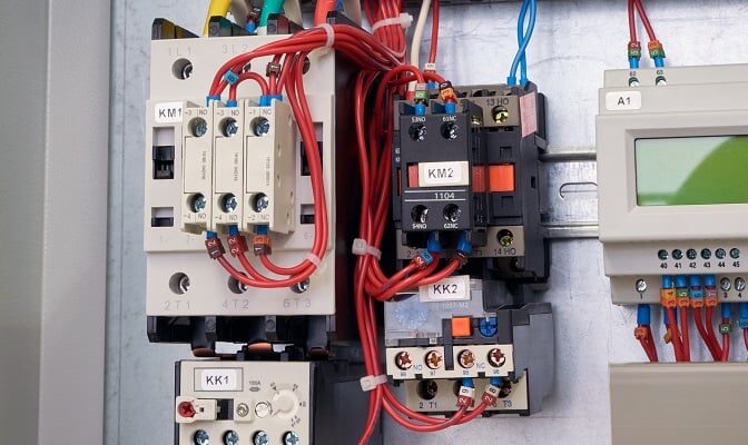 What is the effect of low voltage on an electric motor?